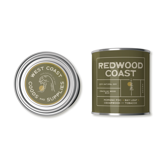 This product is a scented candle from "Kernowfornia Soul Candle Co" with a natural, minimalist design. It features the scent "Redwood Coast" with notes of Morning Fog, Bay Leaf, and Tobacco and Cedarwood.  The tin is a neutral dark olive green. Made with 100% natural soy and a crackling wood wick.